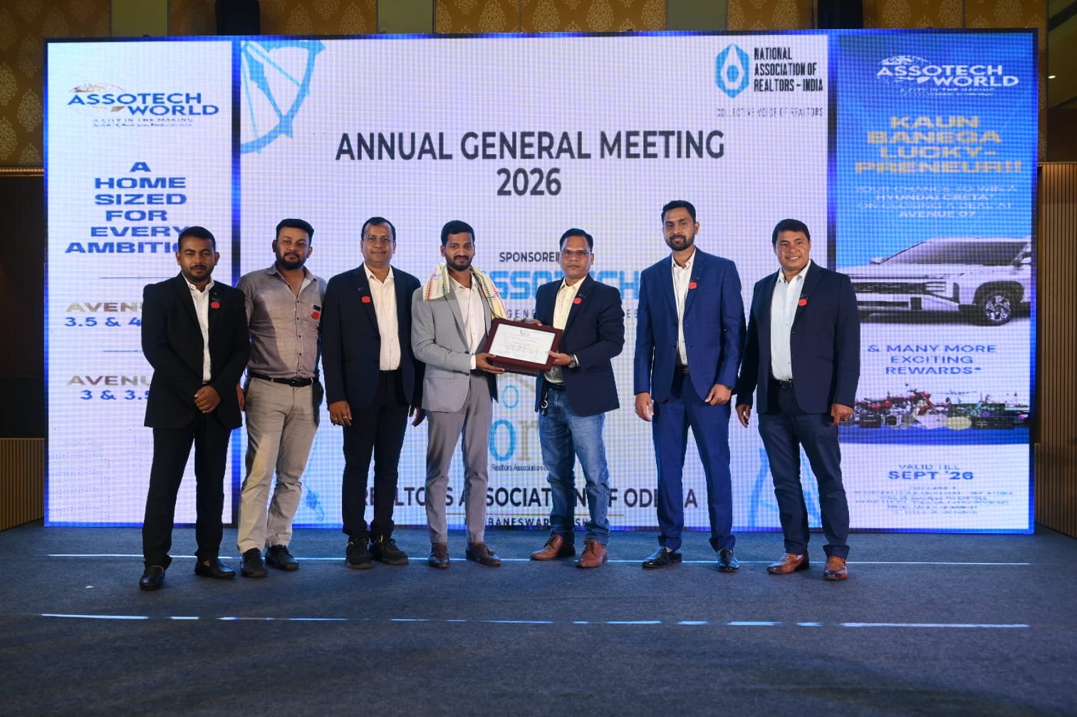Saroj Sethy stage felicitation at AGM 2026