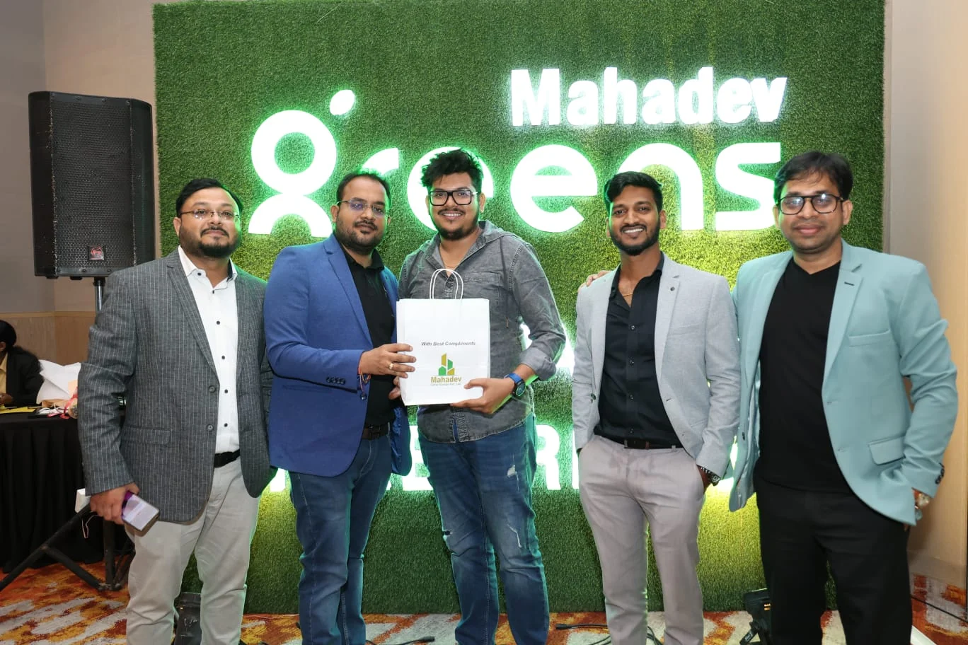Professional interaction during a residential project launch gathering